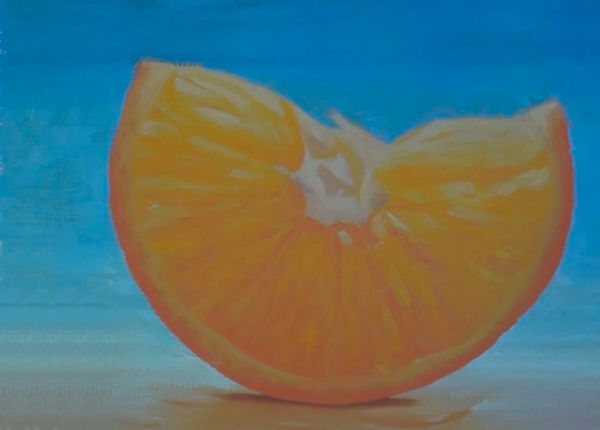 slice of orange painting after adding complementary colours